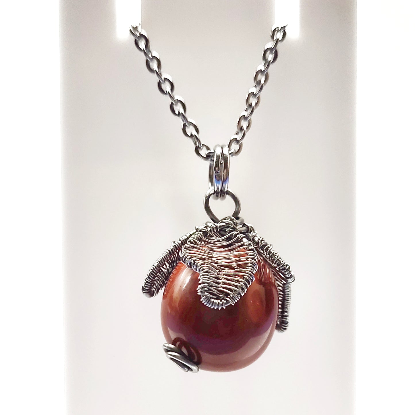 Wire wrapped stone pendant with stainless steel chain