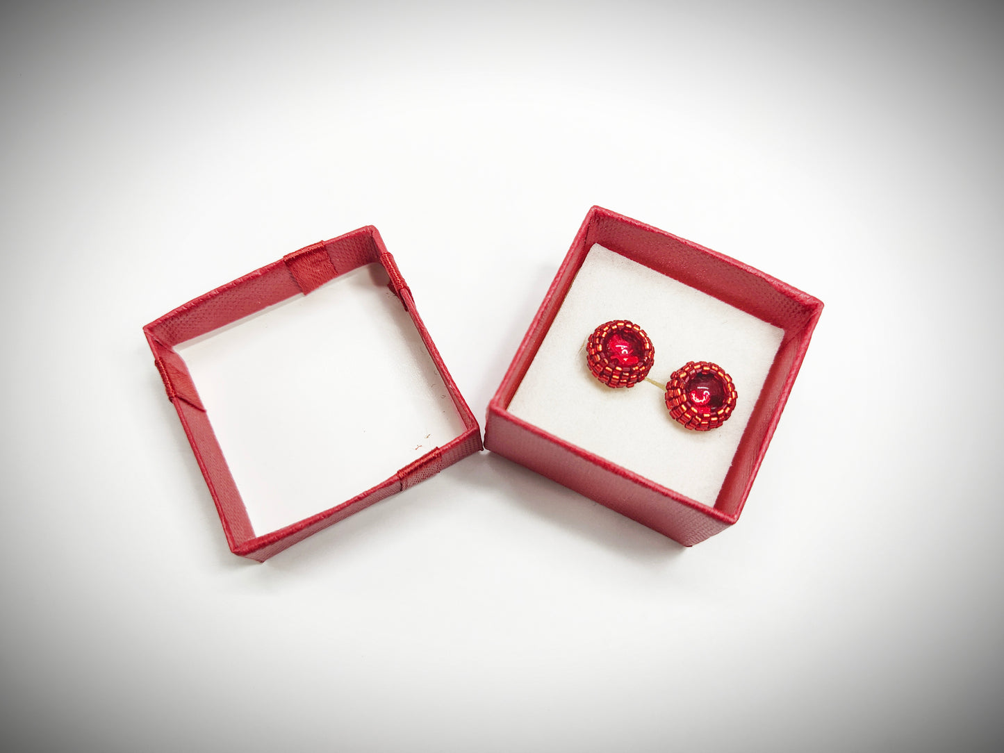 Red beaded stud earrings