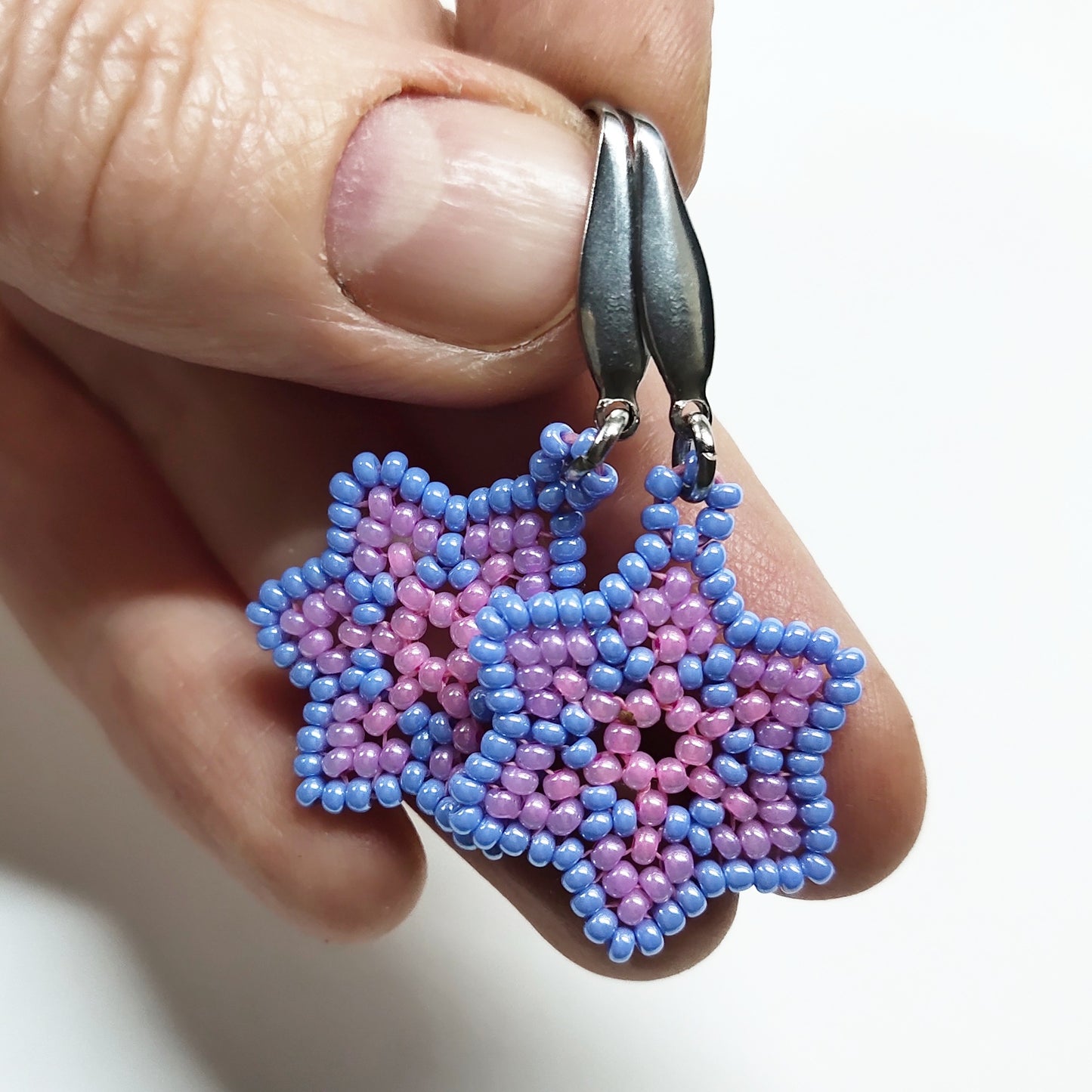 Light blue and pink beaded star earrings