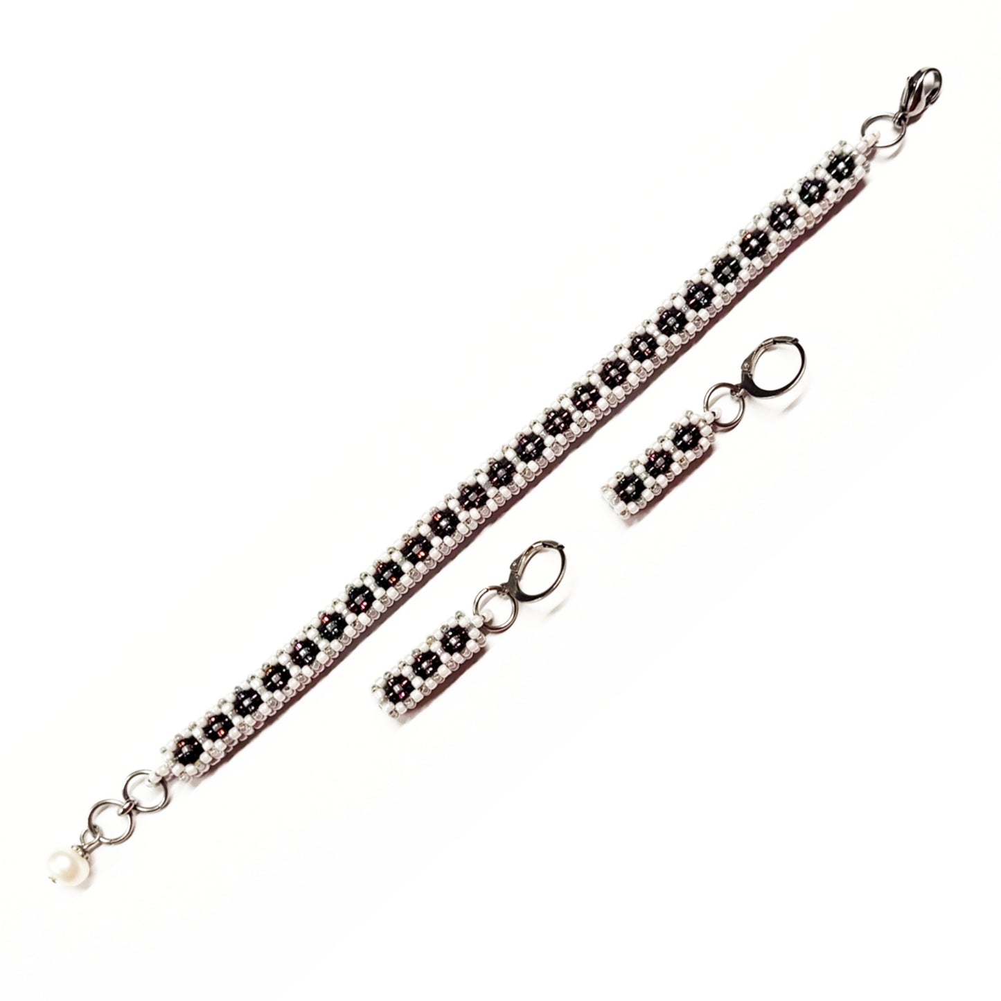 Beaded bracelet and earrings set in white, greyish silver colour and dark multi-colours