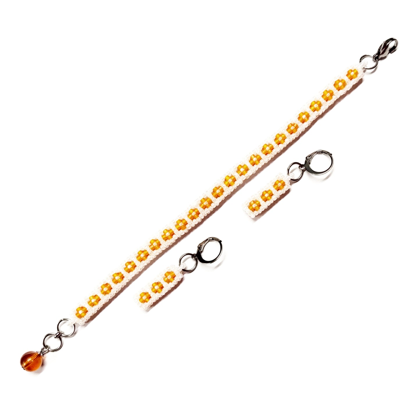 Beaded bracelet and earrings set in pearly white and orange colour