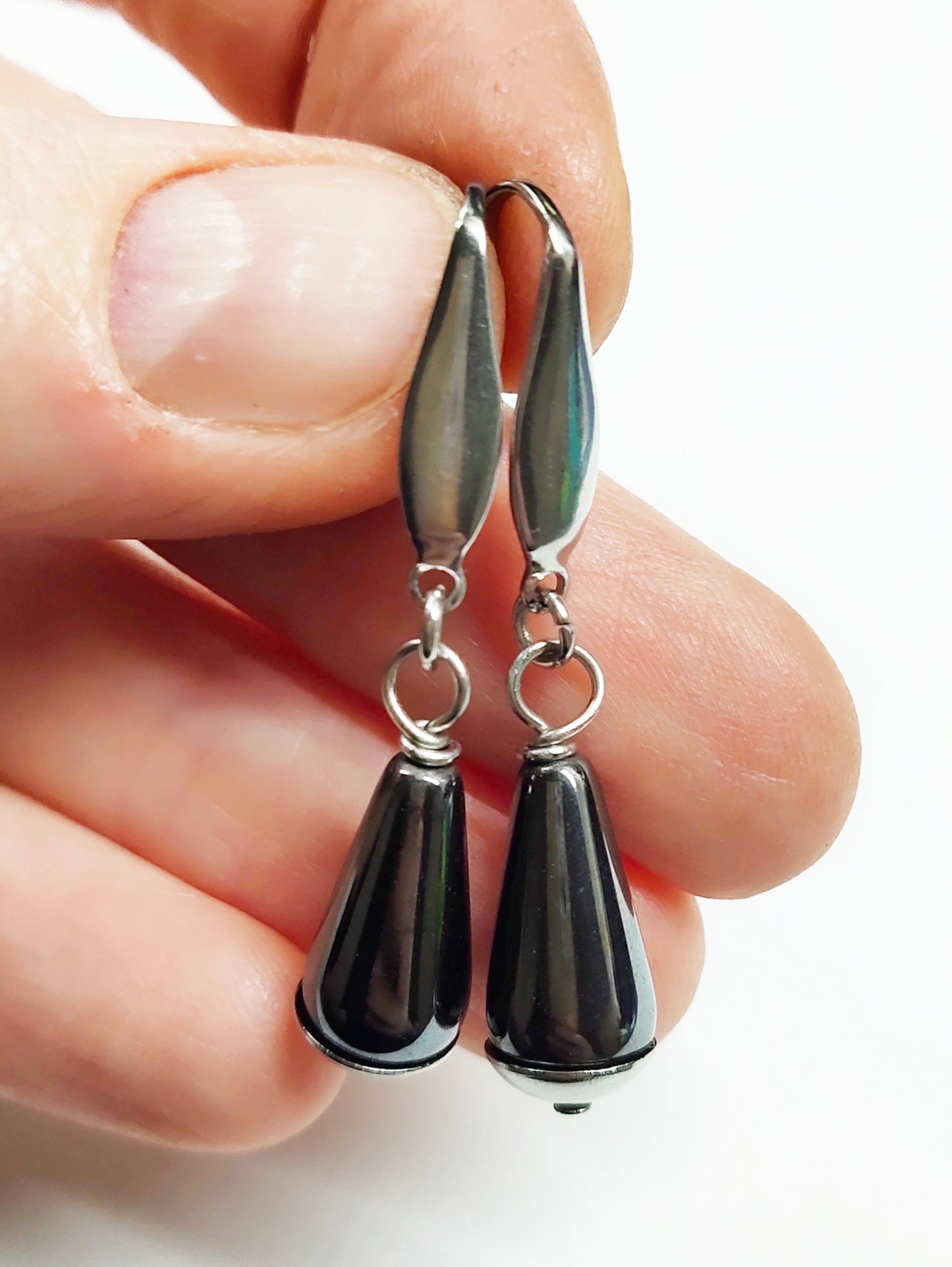 Dangling black hematite drop earrings