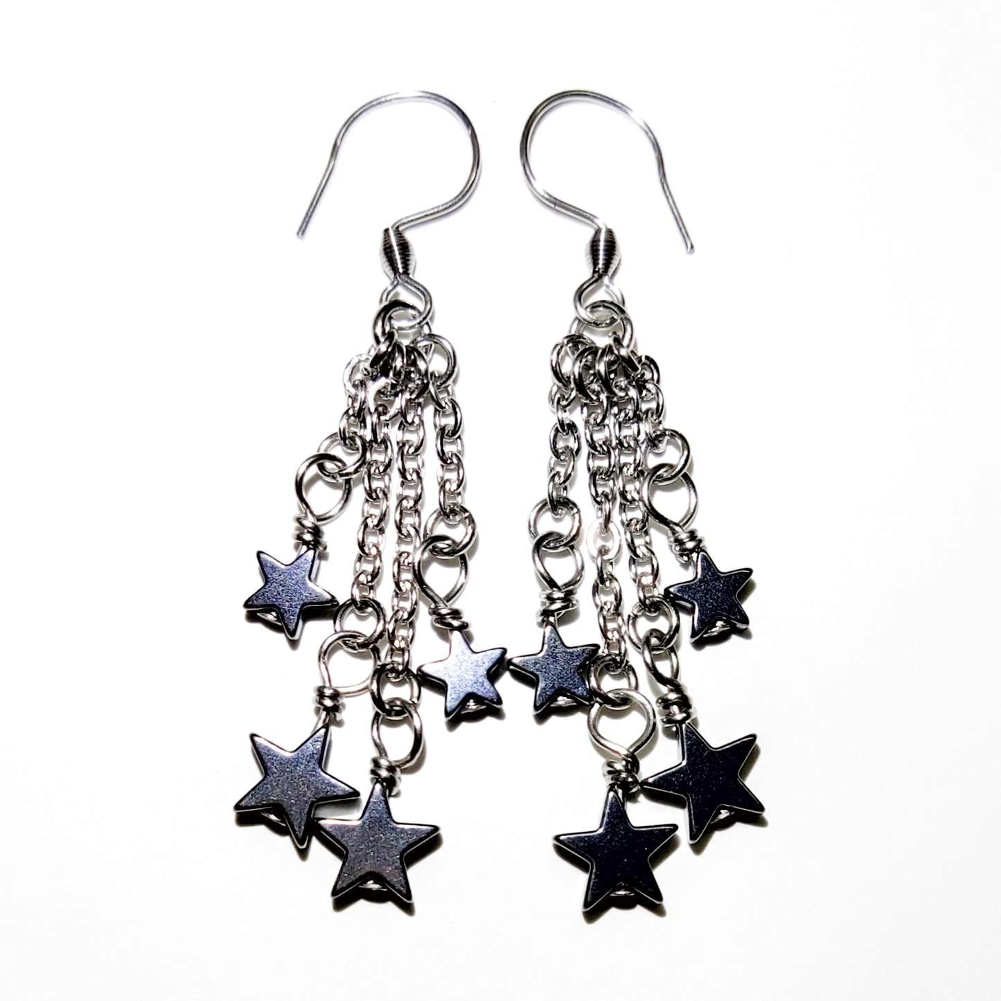 Dangling earrings with black hematite stars