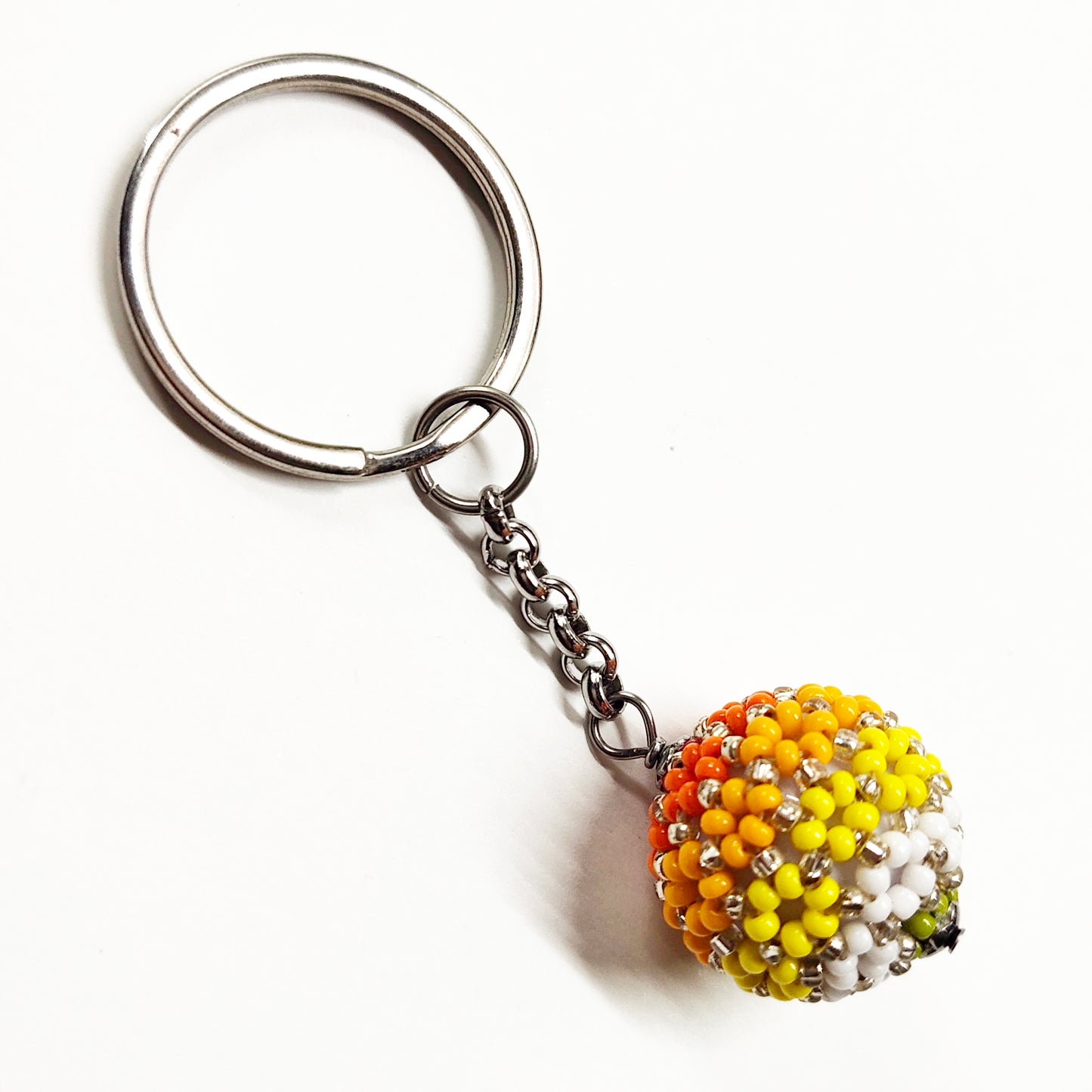 Beaded ball keychain with lines pattern