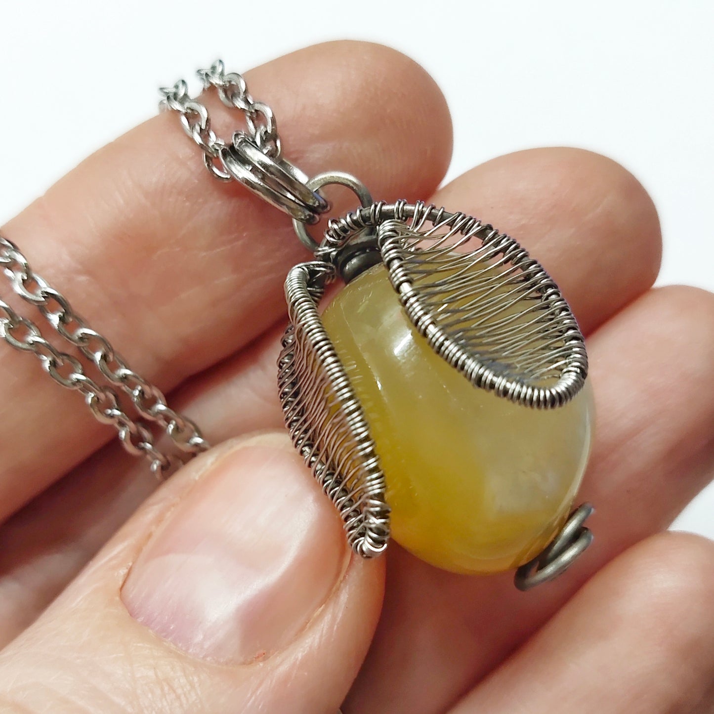 Wire wrapped stone pendant with stainless steel chain