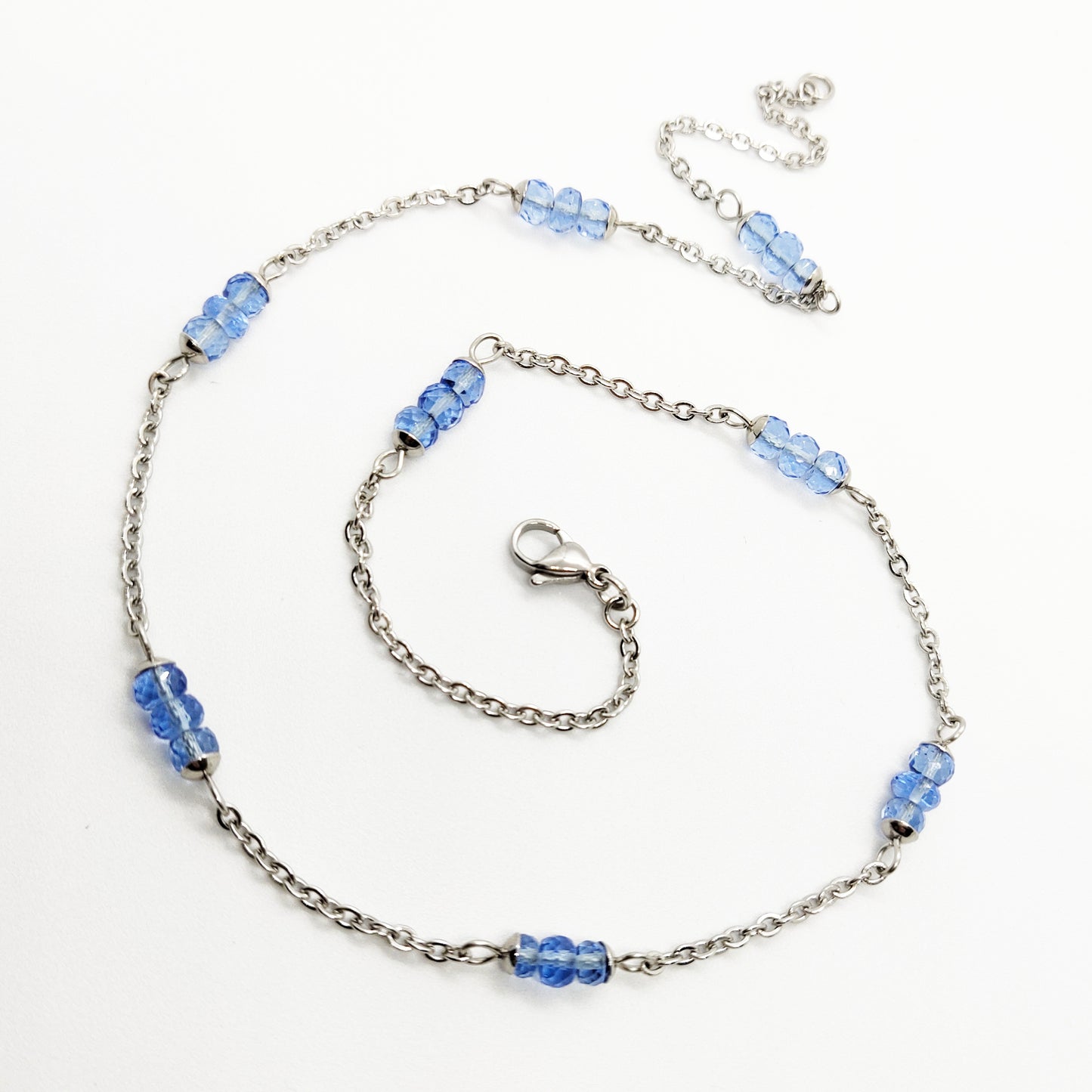 Two matching necklaces with light blue stones #0010