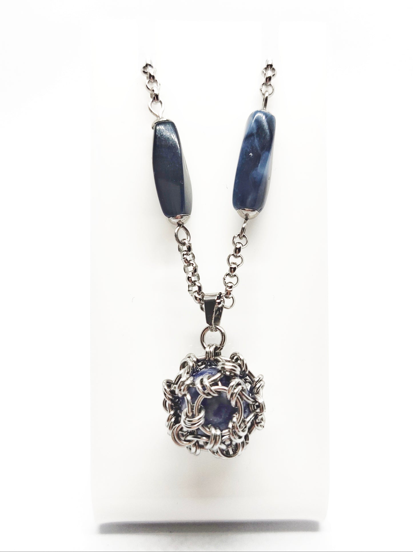 Two matching necklaces with greyish blue stones and a pendant #0005
