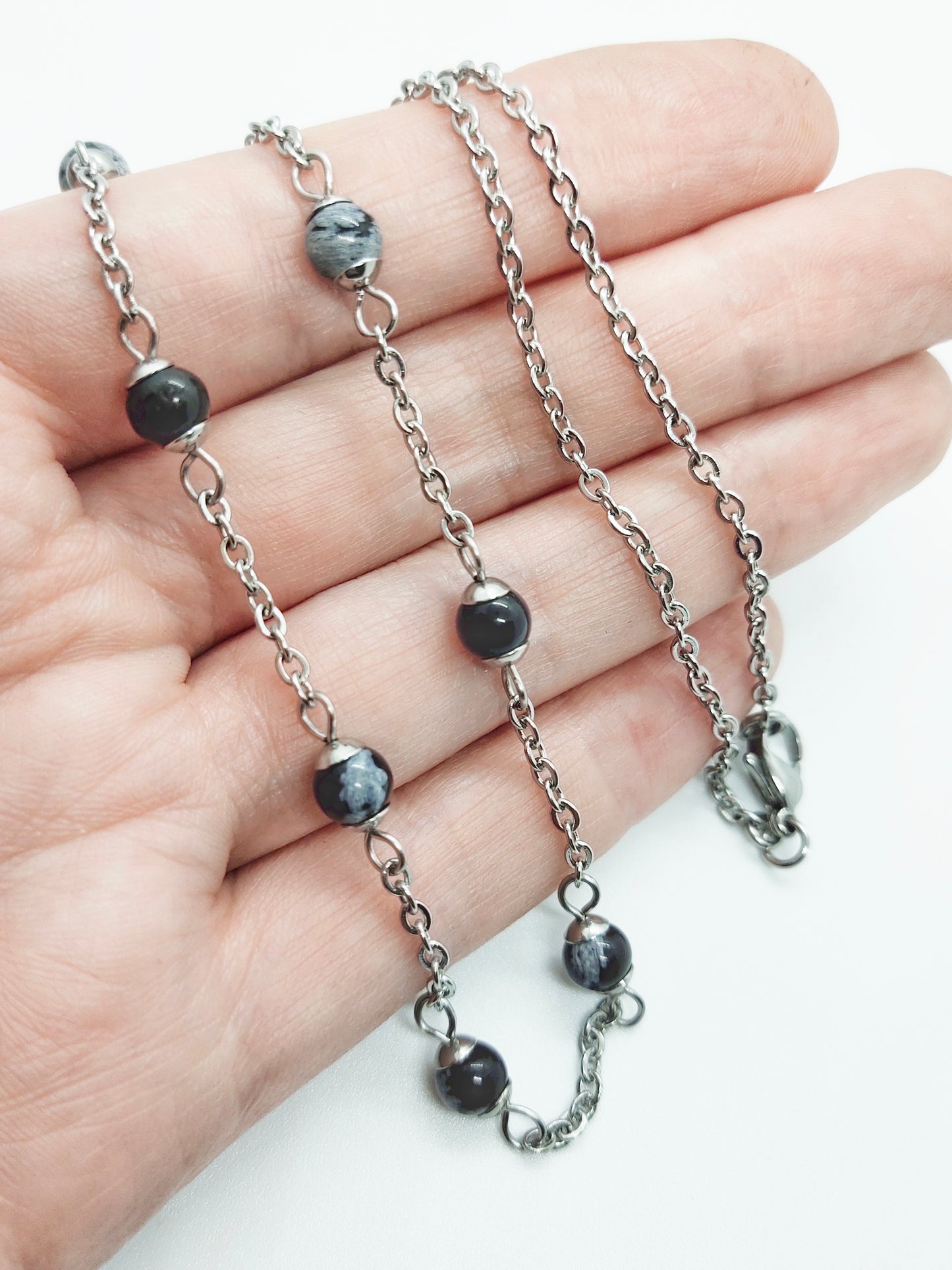 Two matching necklaces with multicolour stone beads, off-white pearls and a pendant #0007
