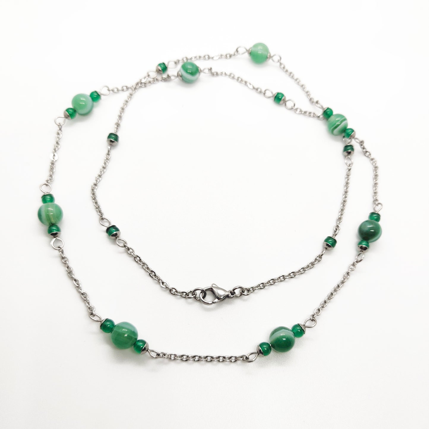 Two matching necklaces with green stone beads and a pendant #0004