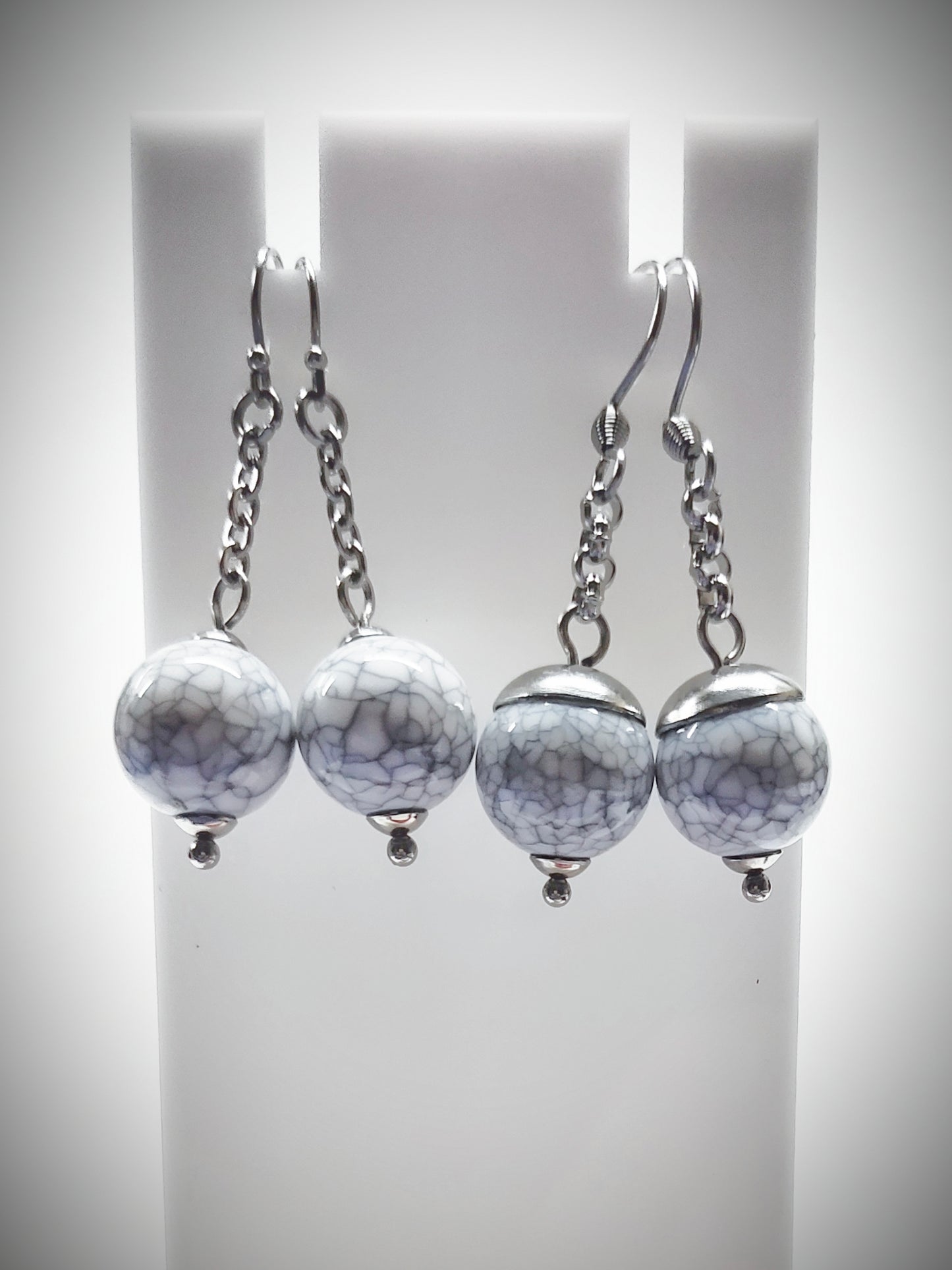 Matching greyish bead earrings for mother and daughter