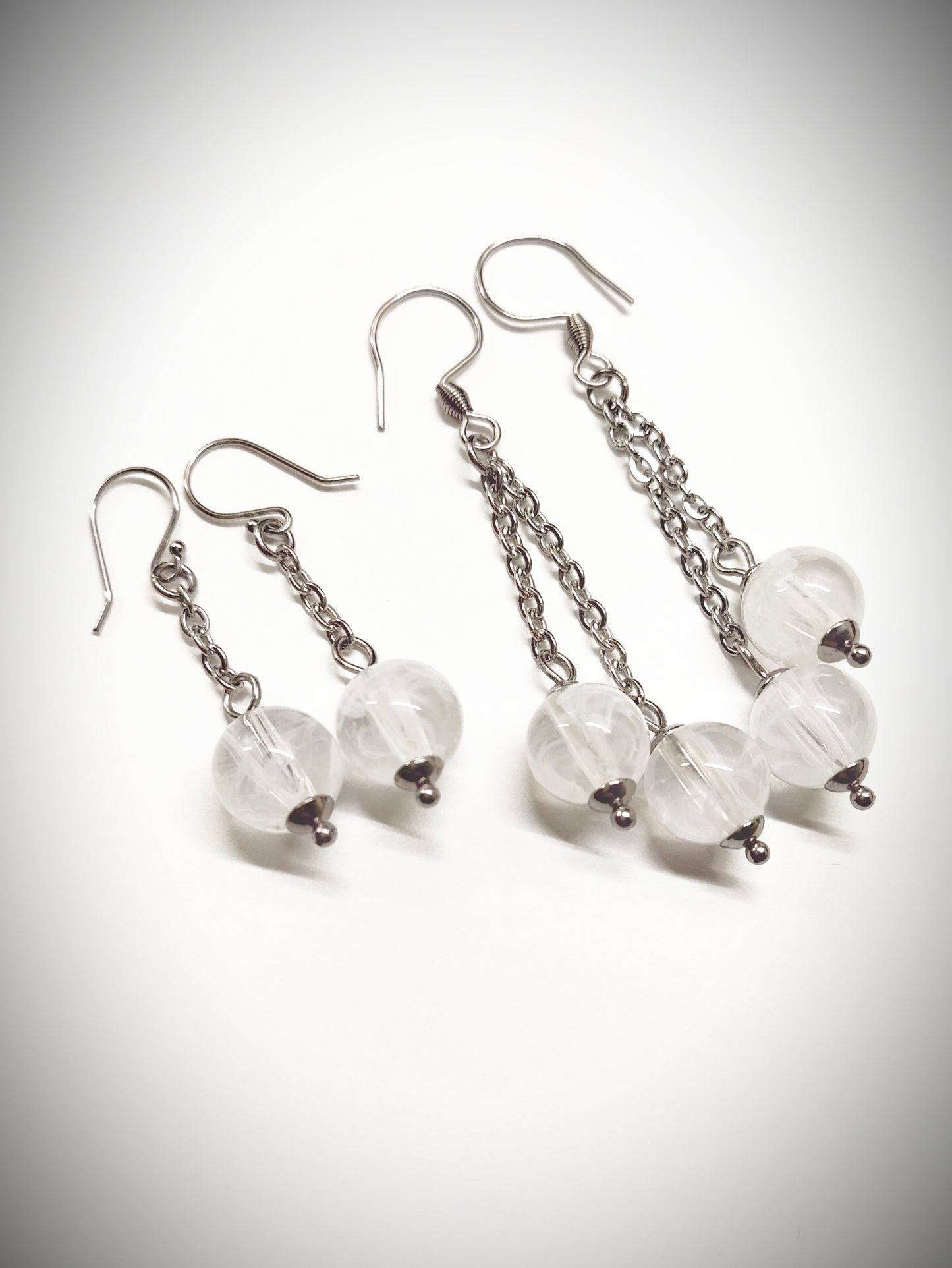 Matching semi clear white bead earrings for mother and daughter