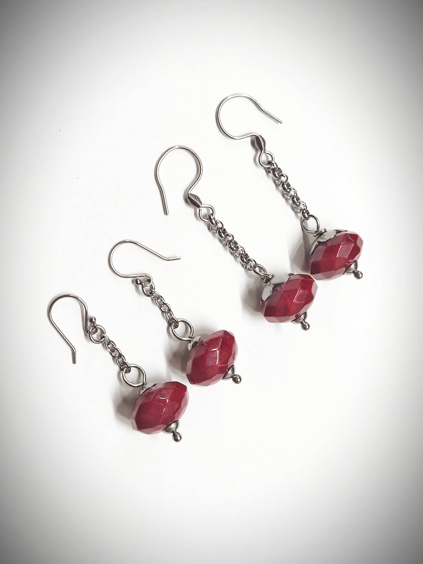 Matching maroon bead earrings for mother and daughter