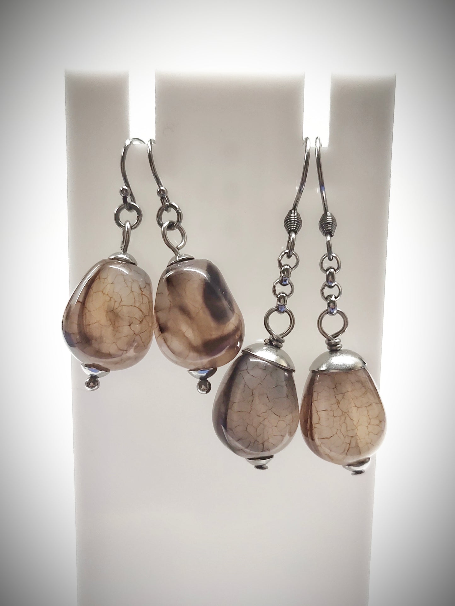 Matching greyish brown bead earrings for mother and daughter