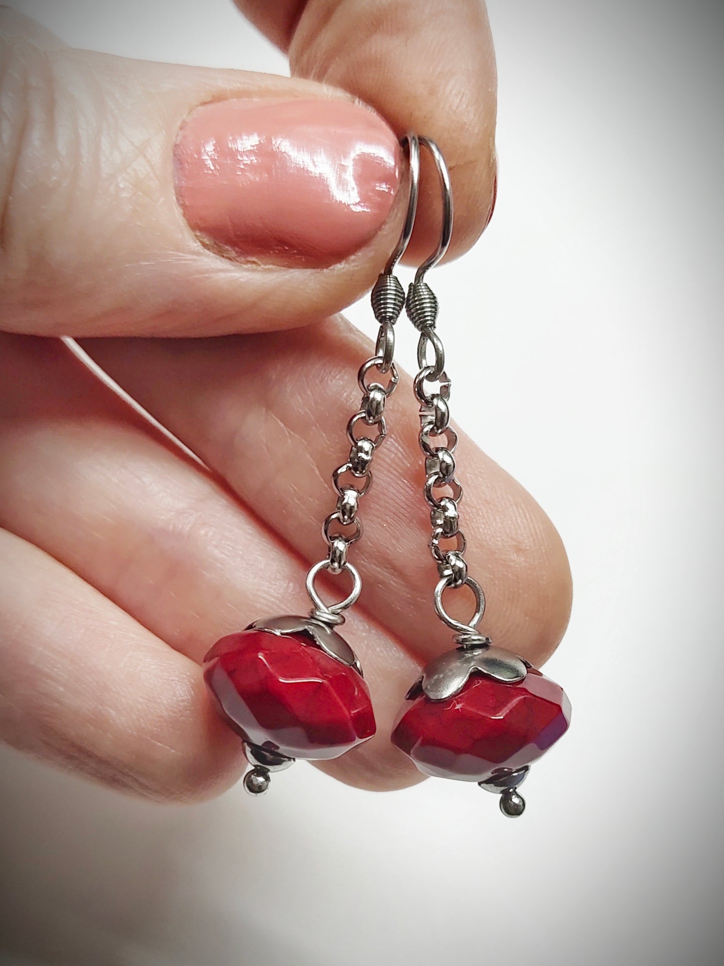 Matching maroon bead earrings for mother and daughter