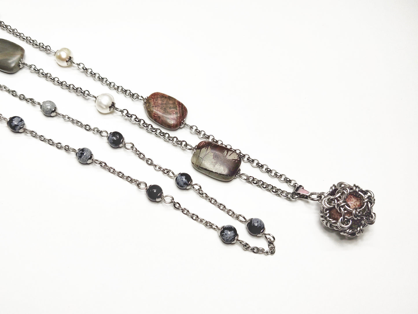 Two matching necklaces with greyish stones, off-white pearls, grey and black stone beads and a pendant #0008