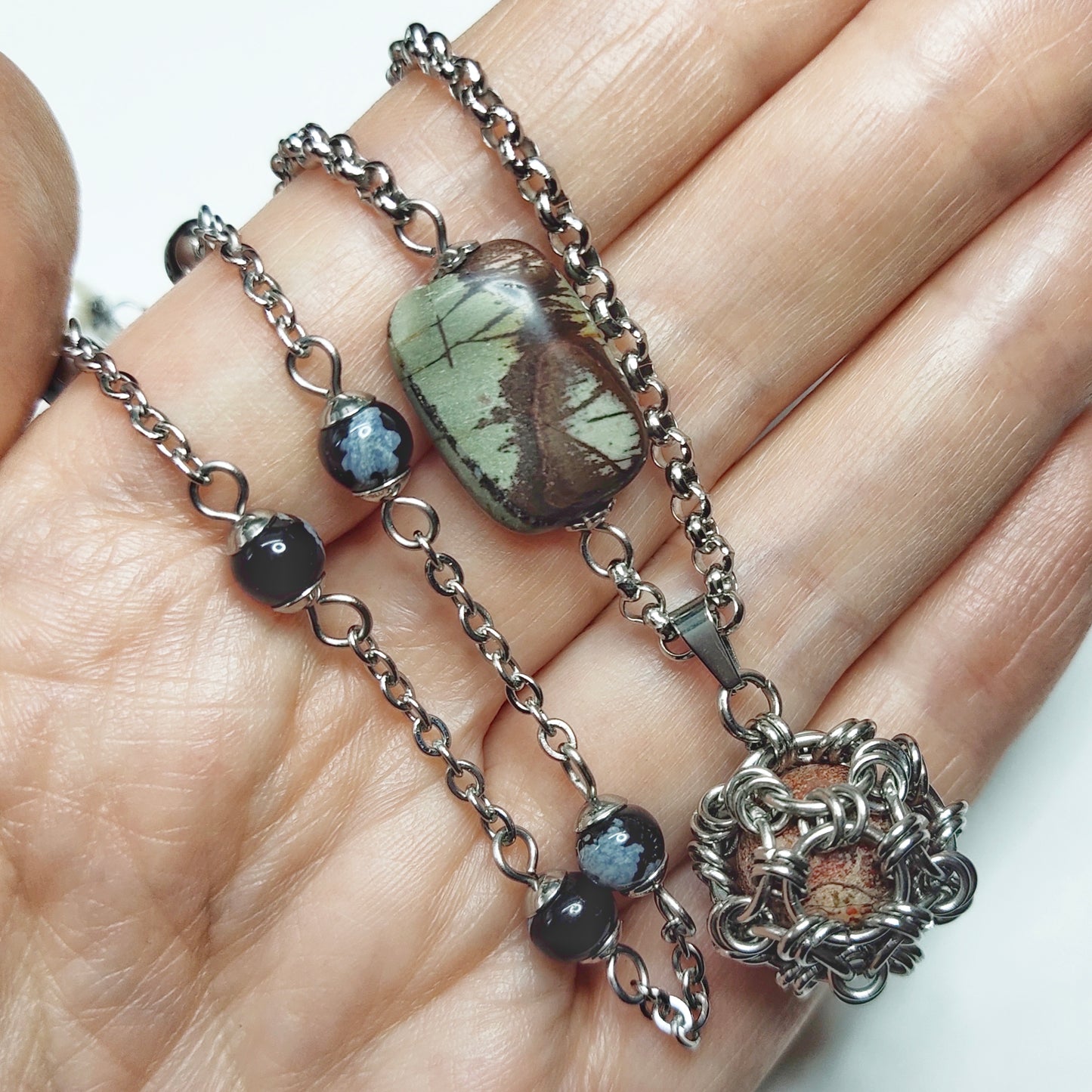 Two matching necklaces with greyish stones, off-white pearls, grey and black stone beads and a pendant #0008