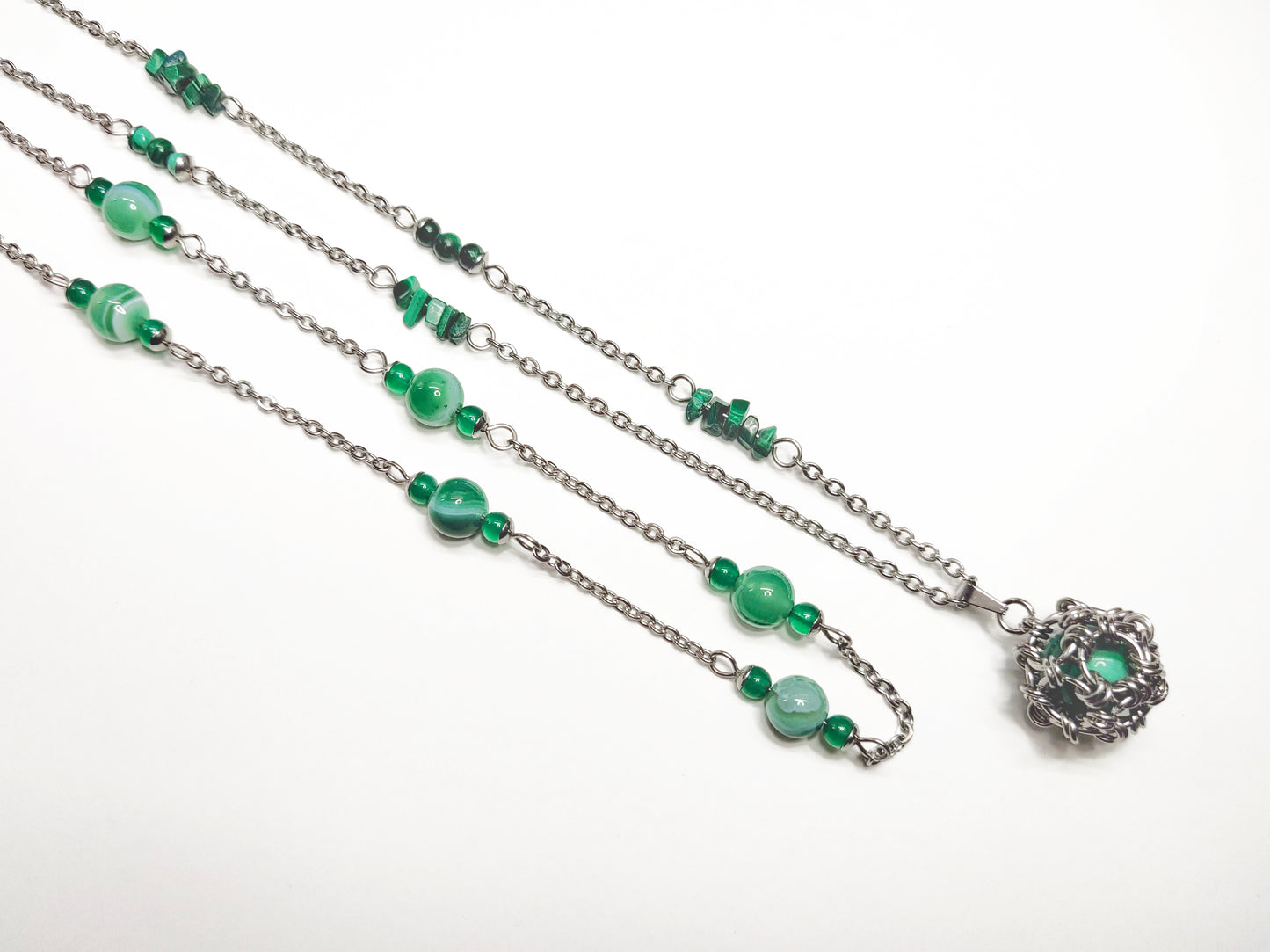 Two matching necklaces with green stone beads and a pendant #0004