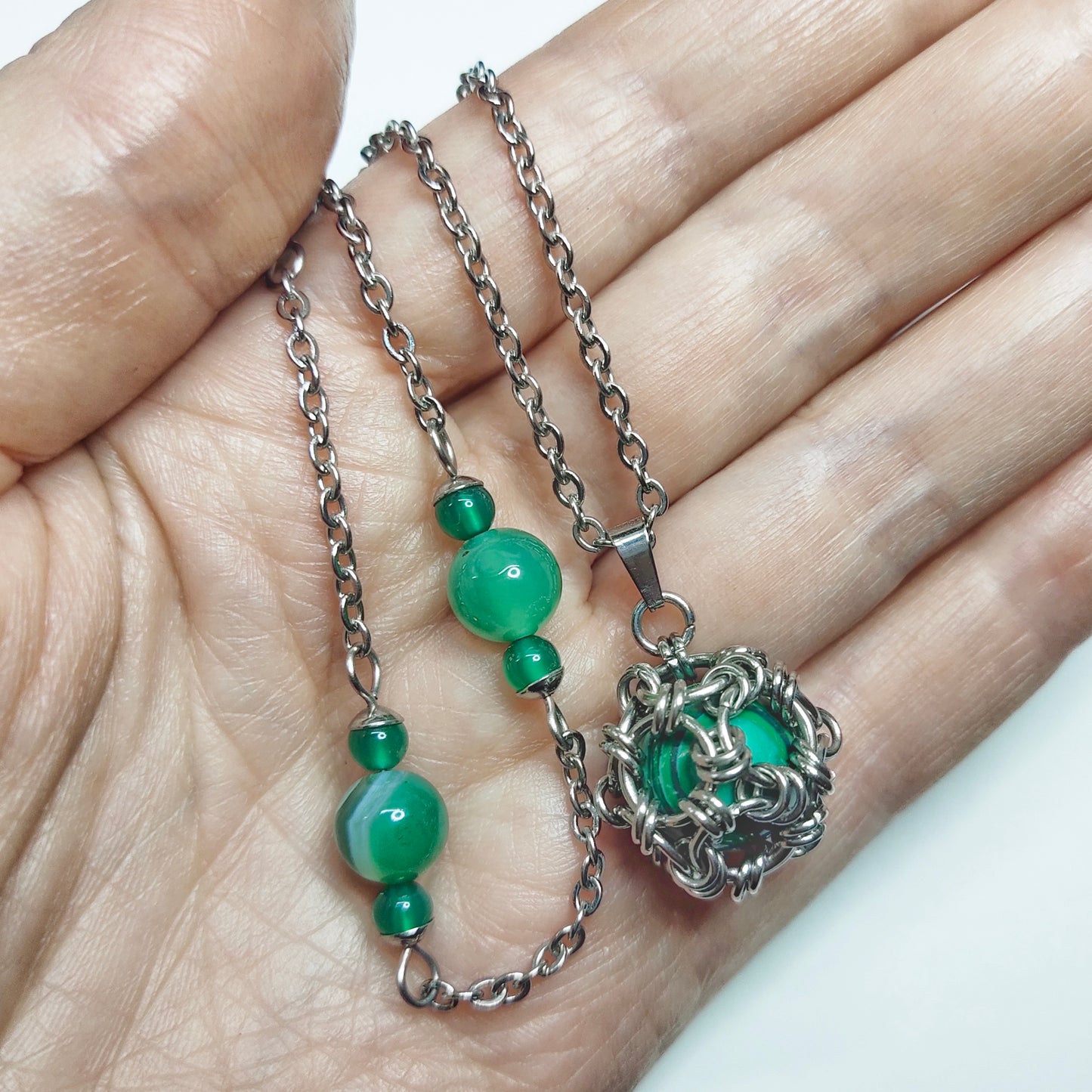 Two matching necklaces with green stone beads and a pendant #0004