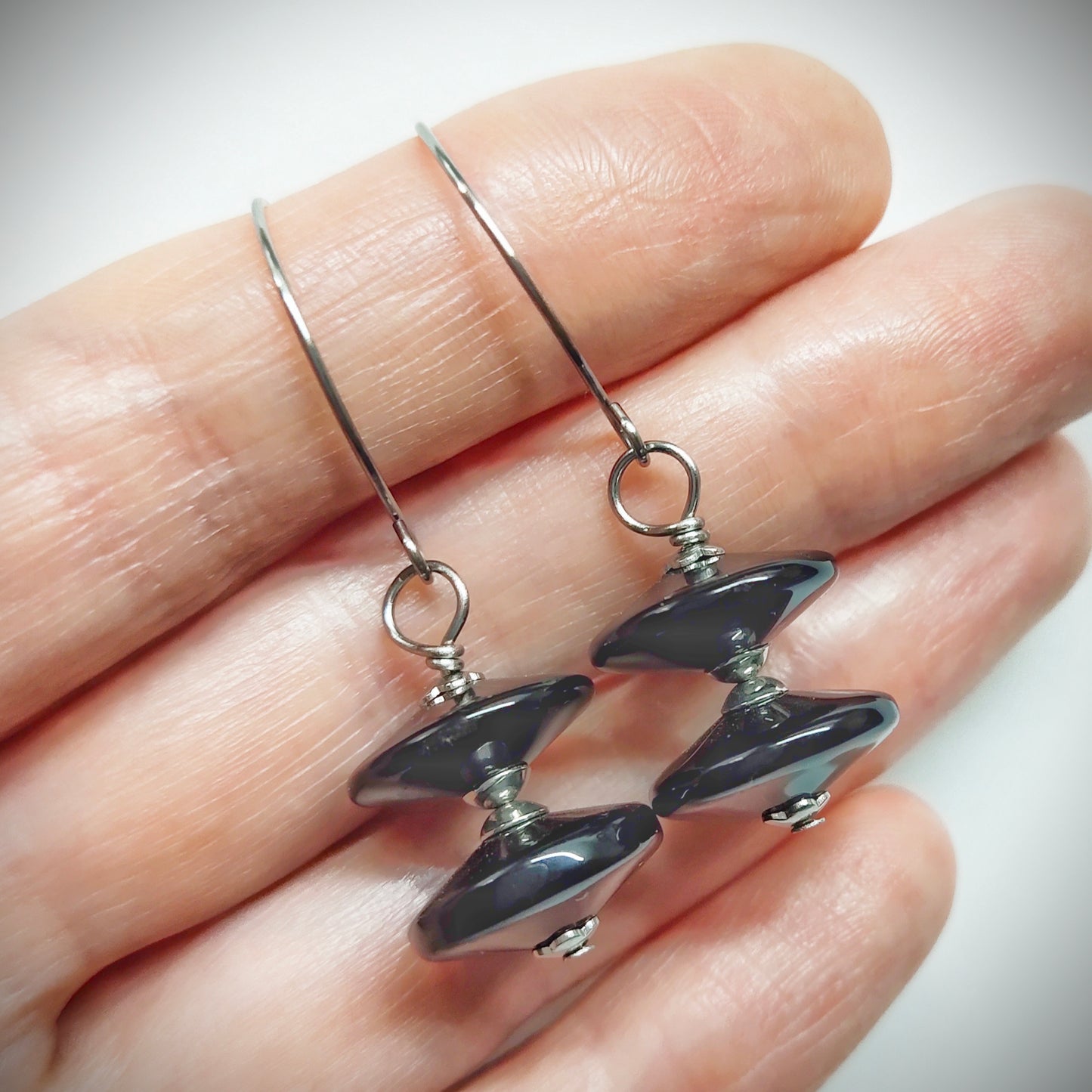 Black statement earrings