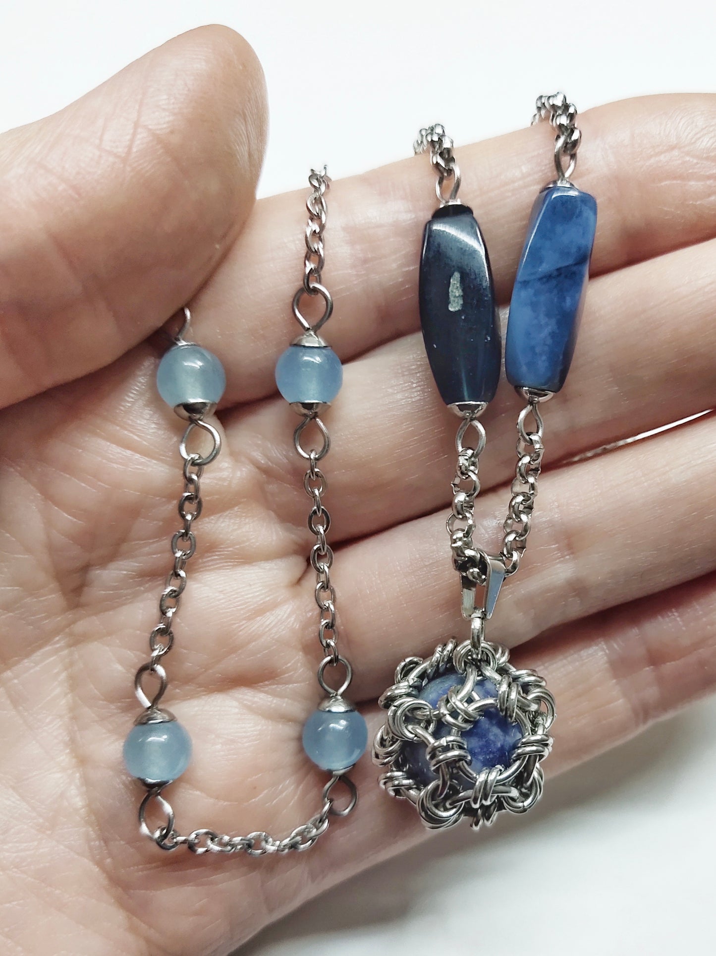 Two matching necklaces with greyish blue stones and a pendant #0005