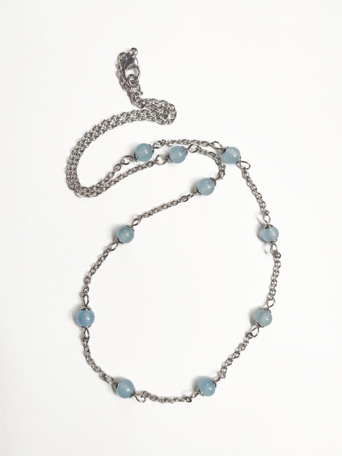 Two matching necklaces with greyish blue stones and a pendant #0005
