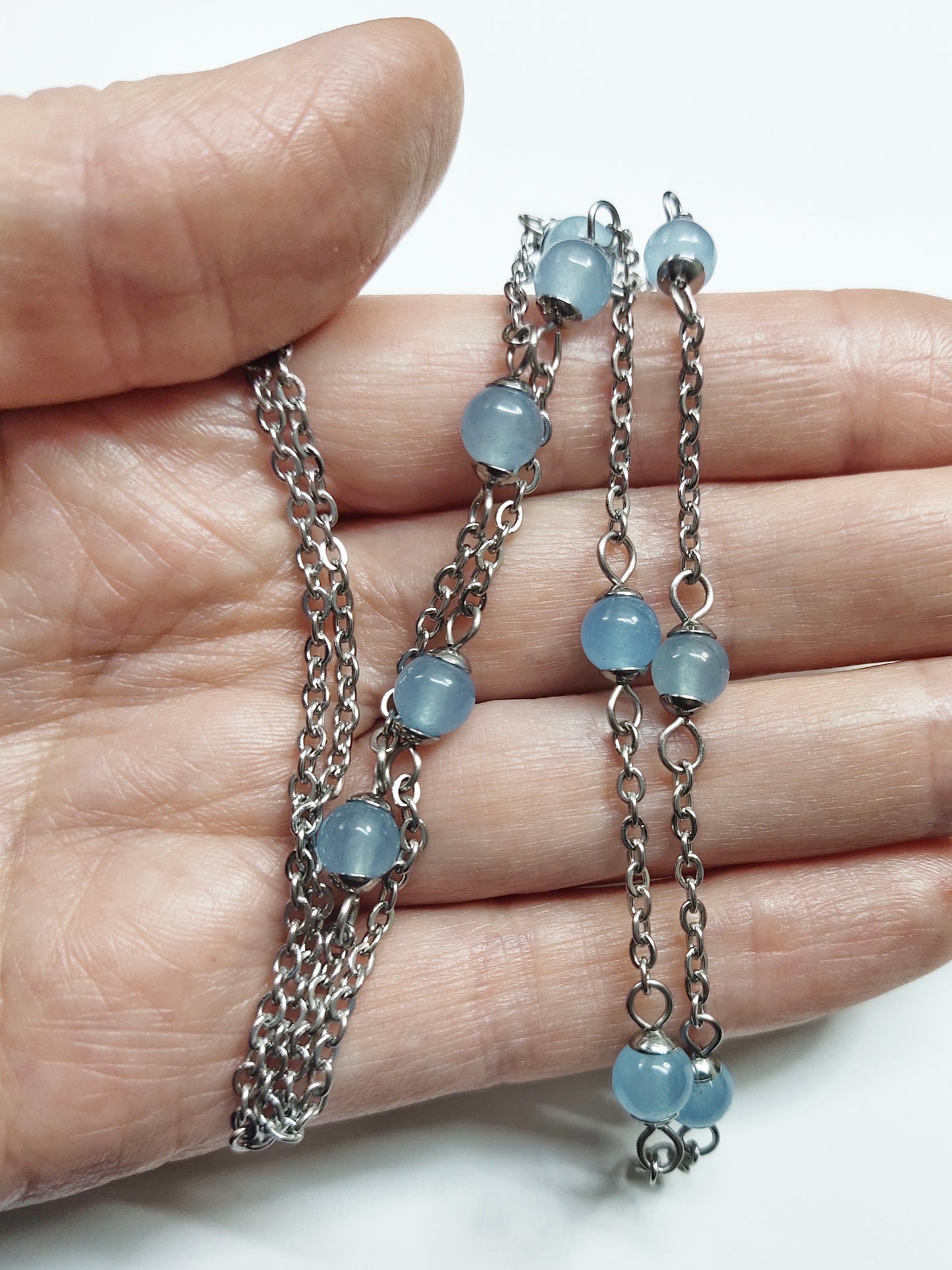 Two matching necklaces with greyish blue stones and a pendant #0005