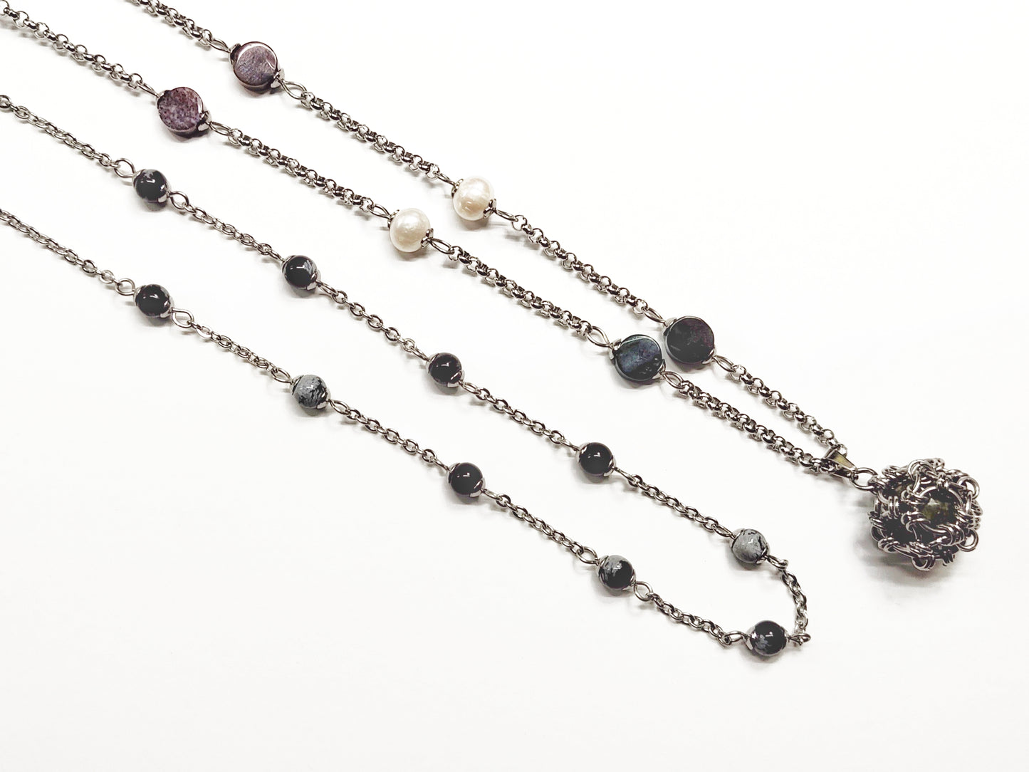 Two matching necklaces with multicolour stone beads, off-white pearls and a pendant #0007