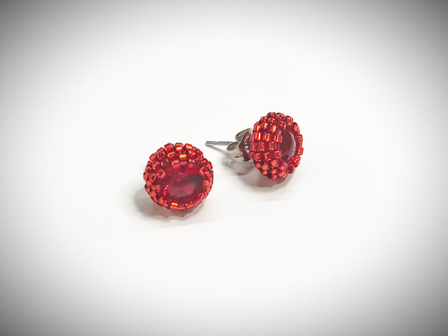 Red beaded stud earrings