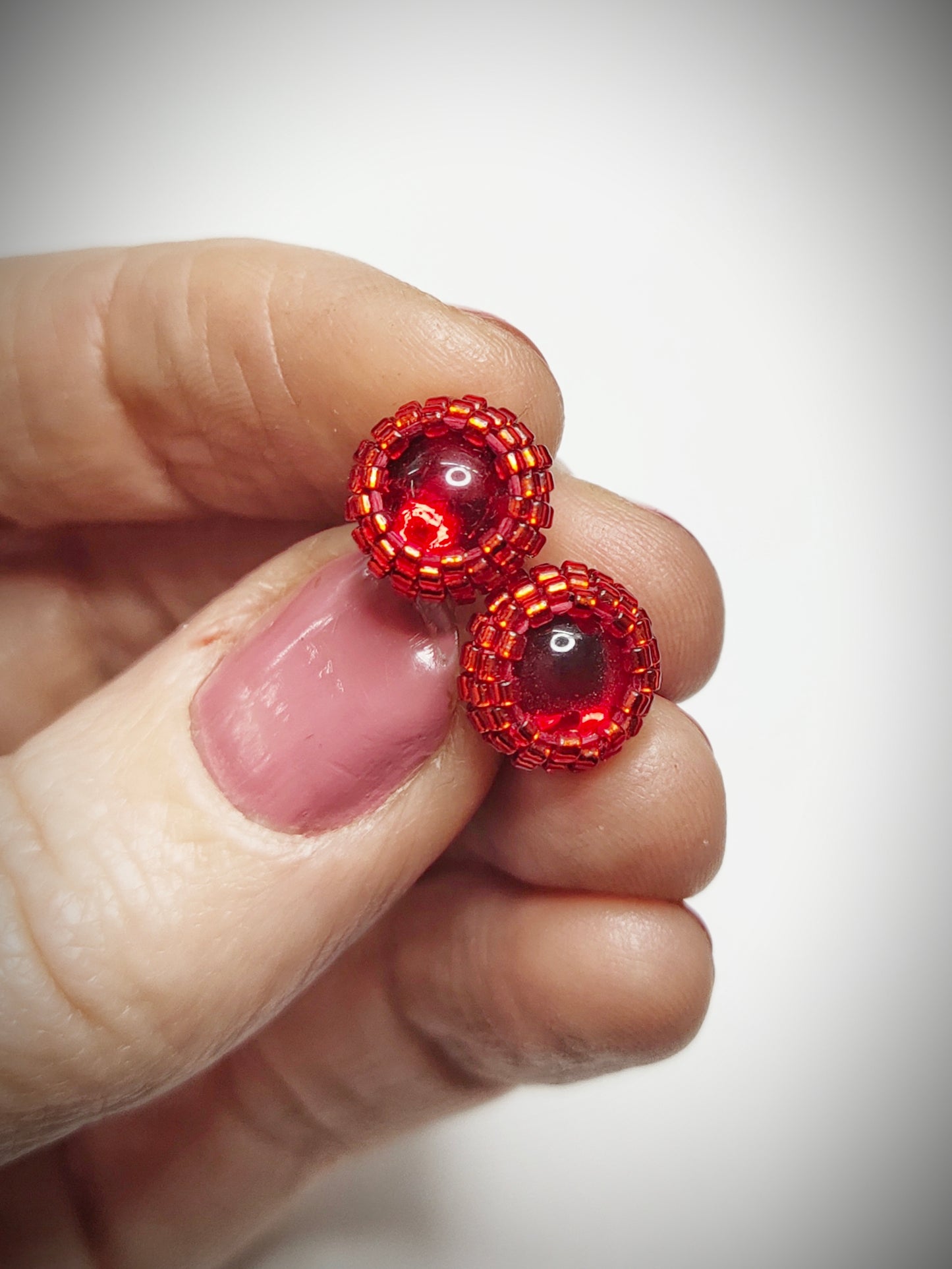 Red beaded stud earrings