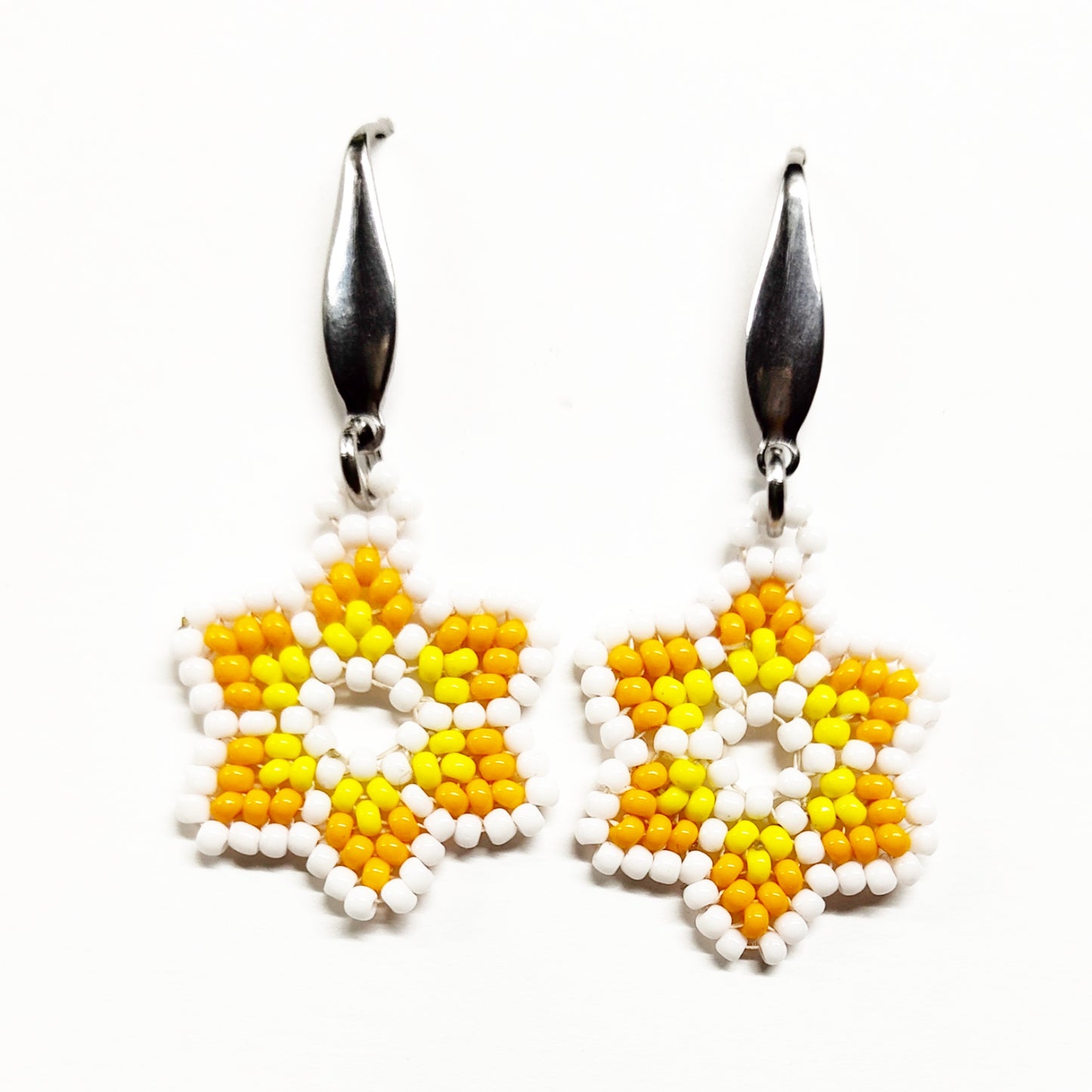 White, orange and yellow beaded star earrings