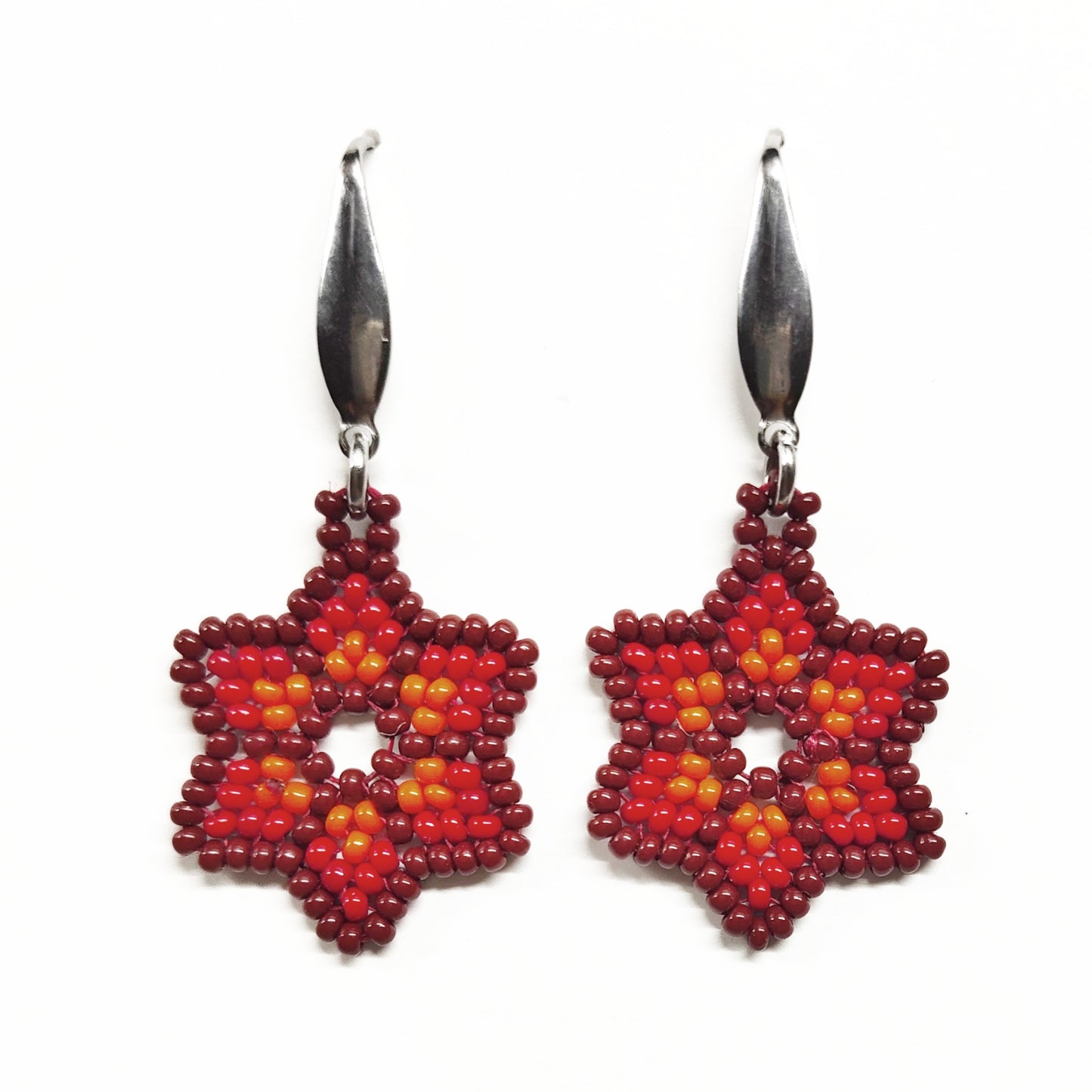 Reddish brown, red and orange beaded star earrings