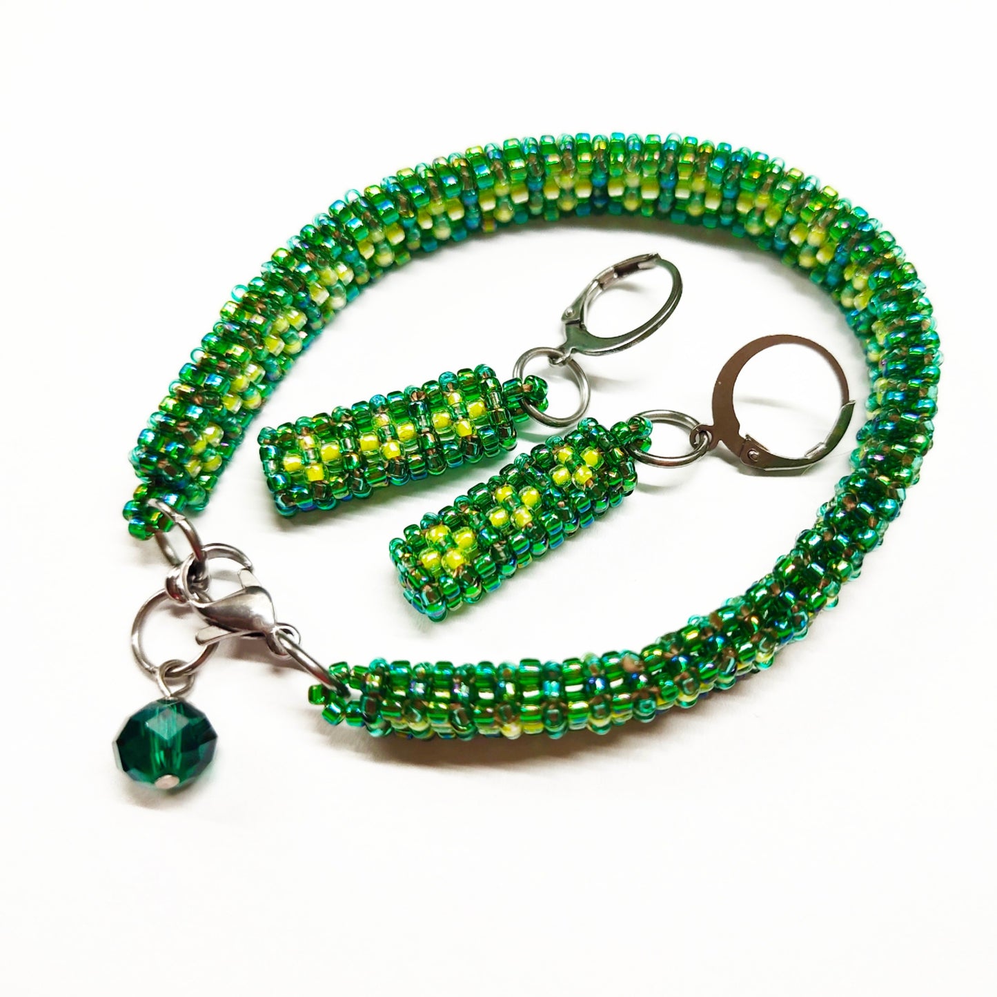 Beaded bracelet and earrings set in blueish green and neon green colour