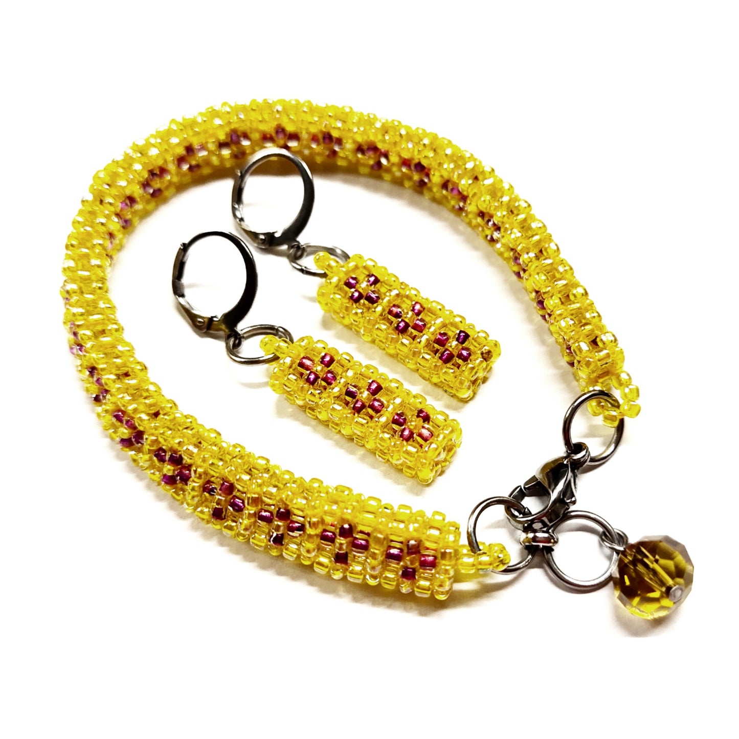 Beaded bracelet and earrings set in yellow and purple colour