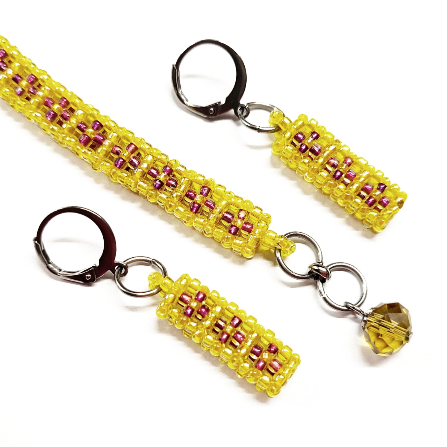 Beaded bracelet and earrings set in yellow and purple colour